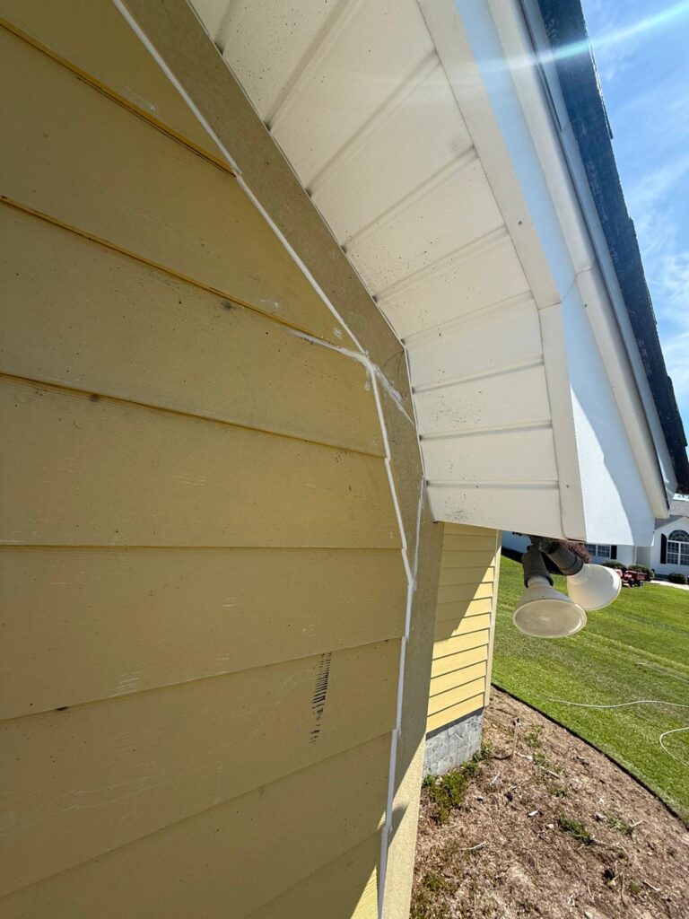 Exterior wood trim and soffit work on a painting project